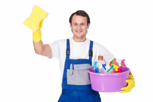 Professional office cleaners working in a Hampstead workspace