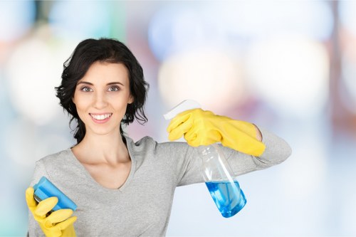 Local cleaner tidying a Hampstead kitchen