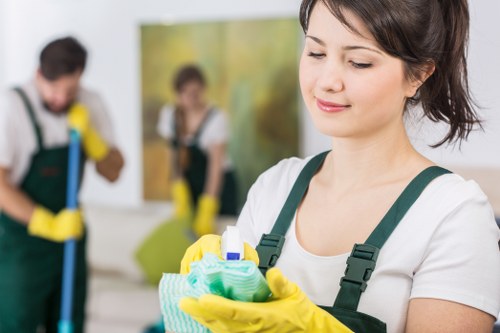 Trained carpet cleaner wearing PPE during a professional cleaning job